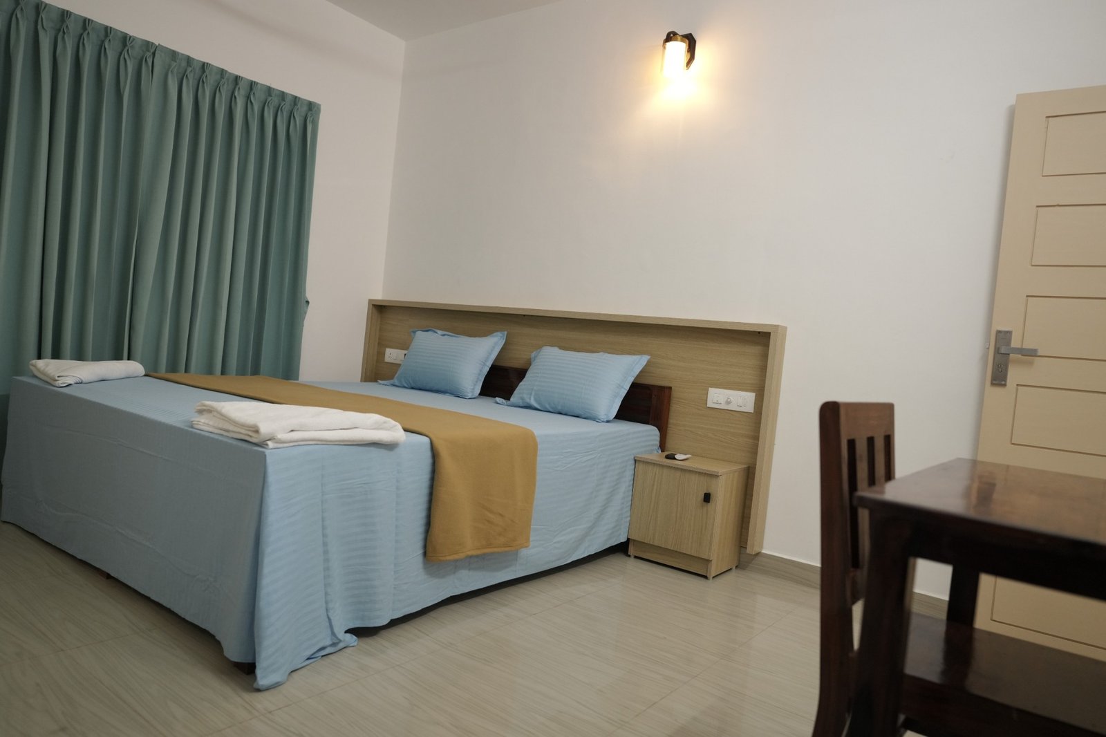 Simple, welcoming spaces at Chaithram Tourist Home, Kovalam Kerala